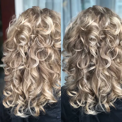 Defined blonde curls styled at Anna Beauty and Hair Secret